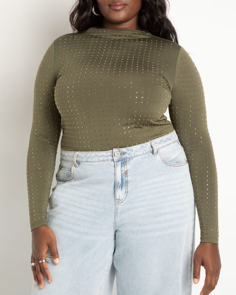 Front of a model wearing a size 14 Rhinestone Funnel Neck Top in Kambaba by ELOQUII. | dia_product_style_image_id:272902